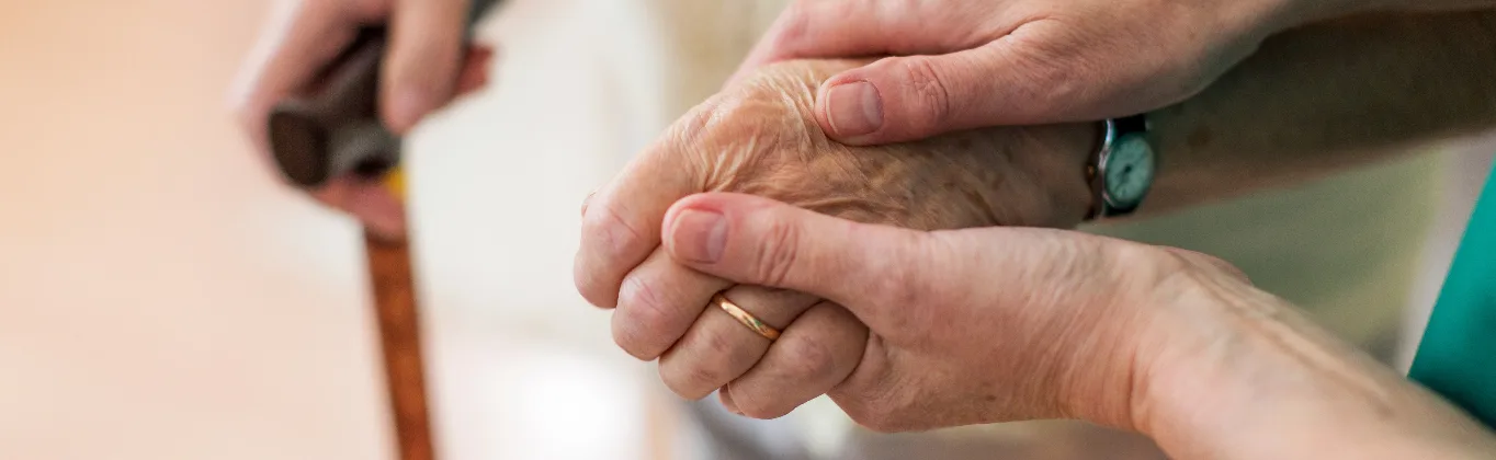 hand holding closeup golden valley senior living daycare staffing